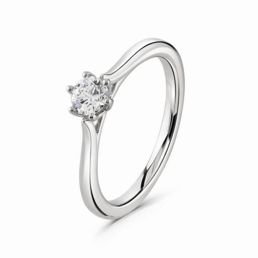 0.31ct Round Brilliant Cut Diamond Solitaire 18ct White Gold Ring texture-diamond  