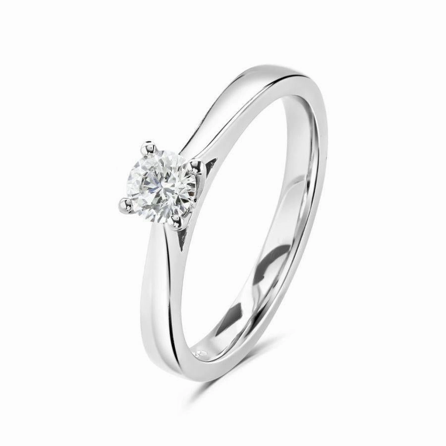 0.31ct Round Brilliant Cut Diamond Solitaire Platinum Ring texture-diamond  