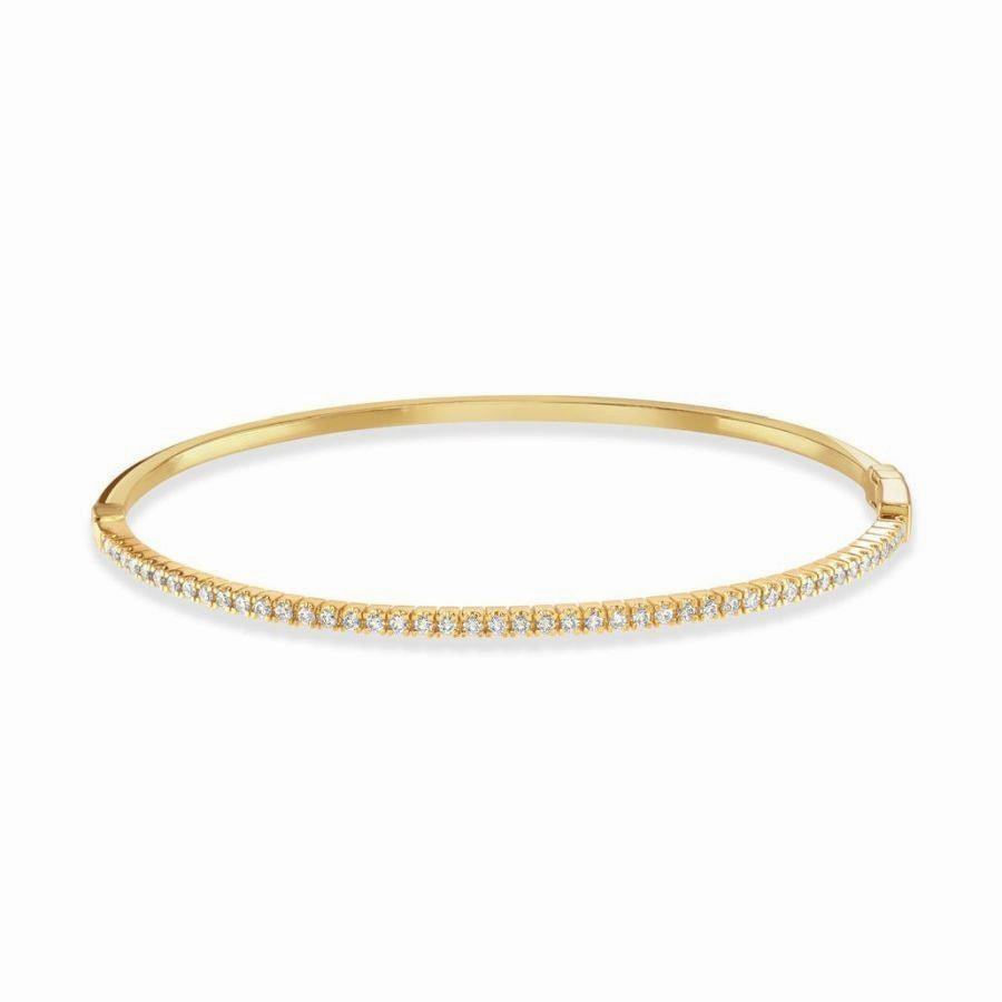 0.59ct Claw Set Round Brilliant Cut Diamond 18ct Yellow Gold Hinged Bangle texture-diamond  
