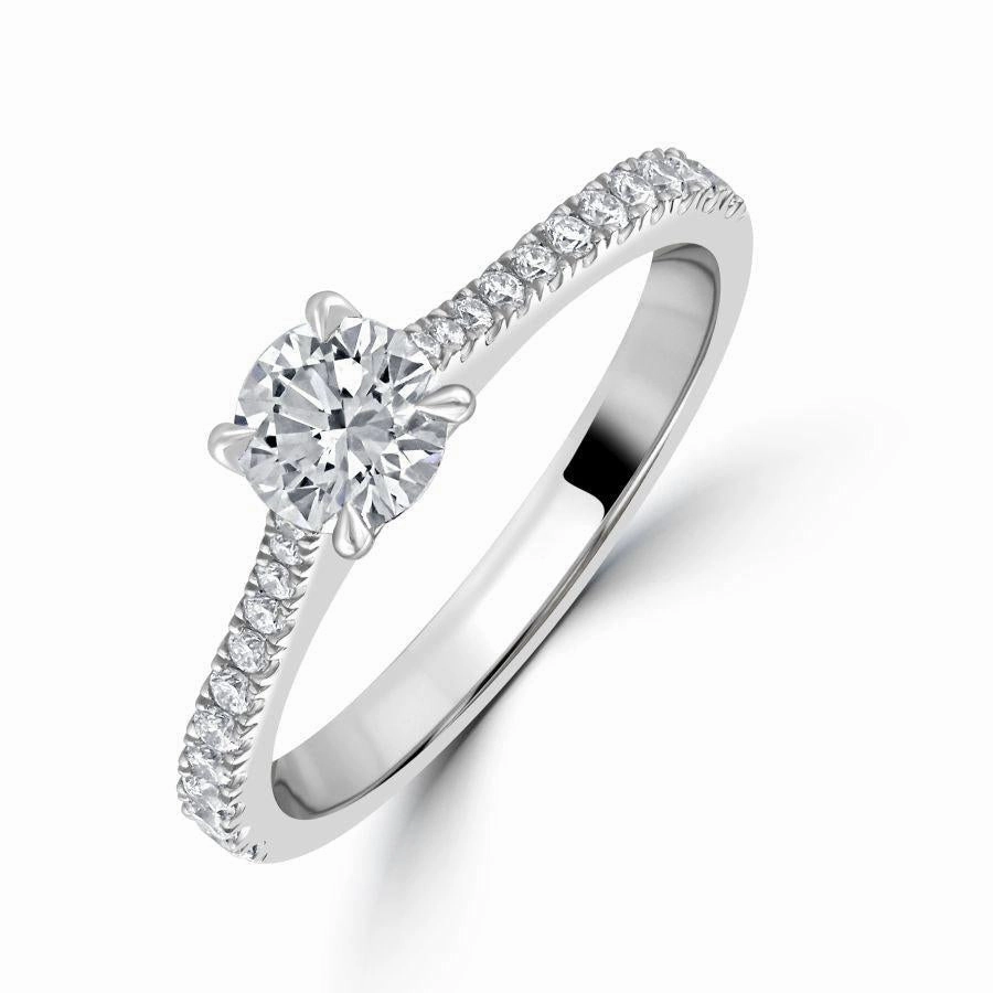 0.69ct Diamond Round Brilliant Cut Solitaire with Diamond set shoulders Platinum Ring texture-diamond  