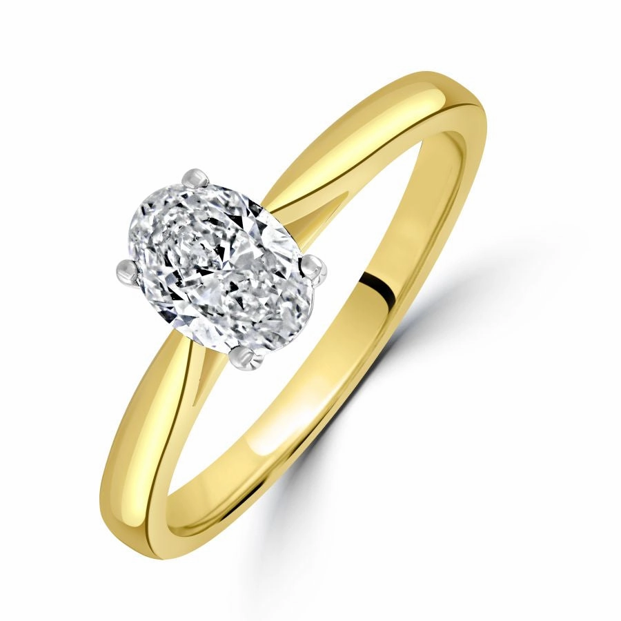 0.72ct Oval Cut Diamond Solitaire 18ct Yellow Gold Ring texture-diamond  