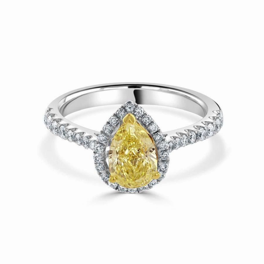 18ct White Gold Pear Cut Yellow Diamond Halo Cluster Ring with Diamond Shoulders texture-diamond  