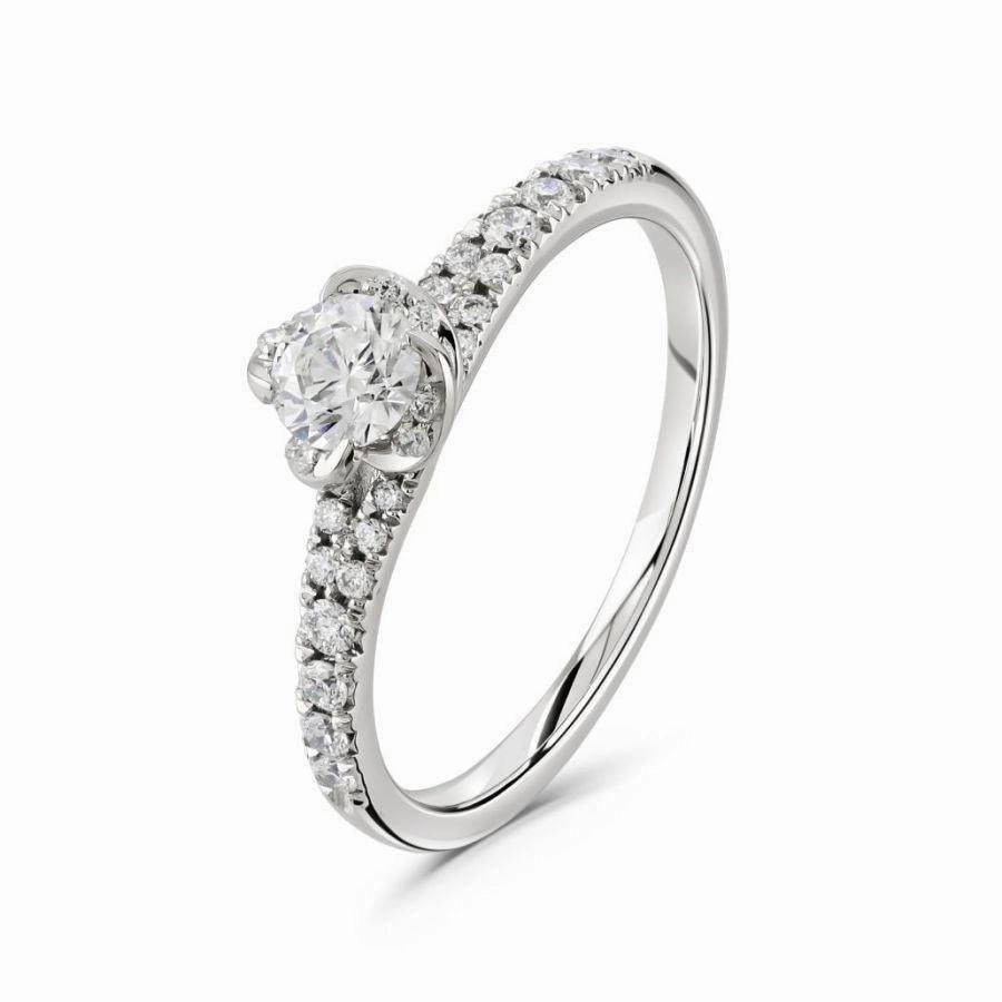 18ct White Gold Round Brilliant Cut Diamond Floral Cluster Ring with Diamond Shoulders texture-diamond  