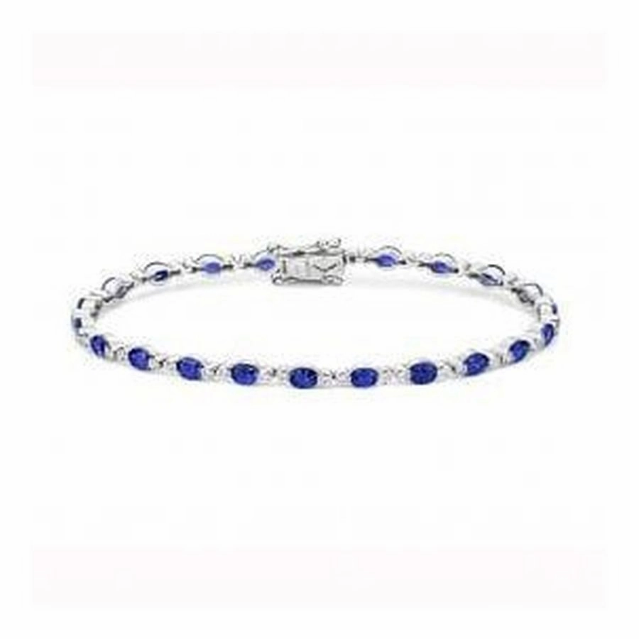 18ct white gold stunning Tanzanite & Diamond bracelet texture-diamond  