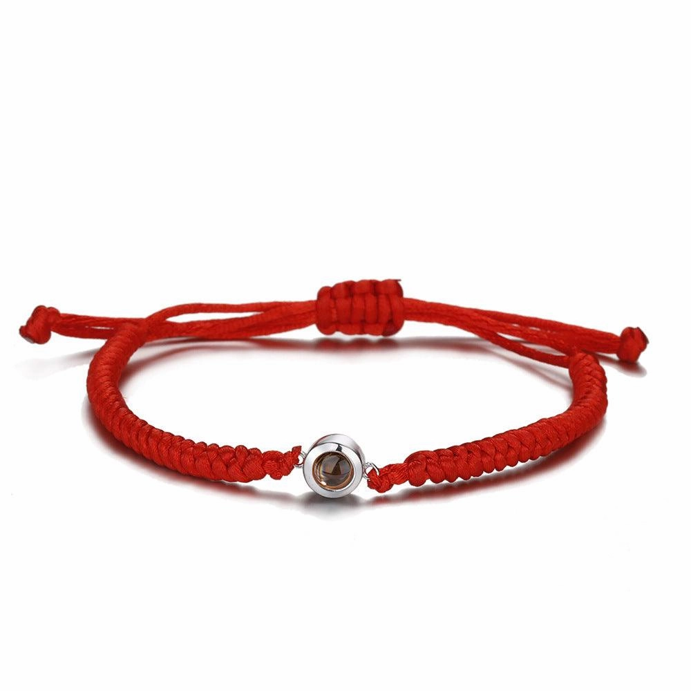 A Pair Of Braided Red And Black Rainbow Hand Ropes