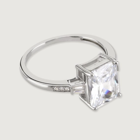 Buckley London The Carat Collection? Clear Baguette With Tapered Baguette Shoulders Ring Rhodium L SS24 fashion-jewelry  