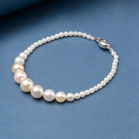 Graduated Natural Pastel Coloured Cultured Akoya Pearl Bracelet texture-pearl  