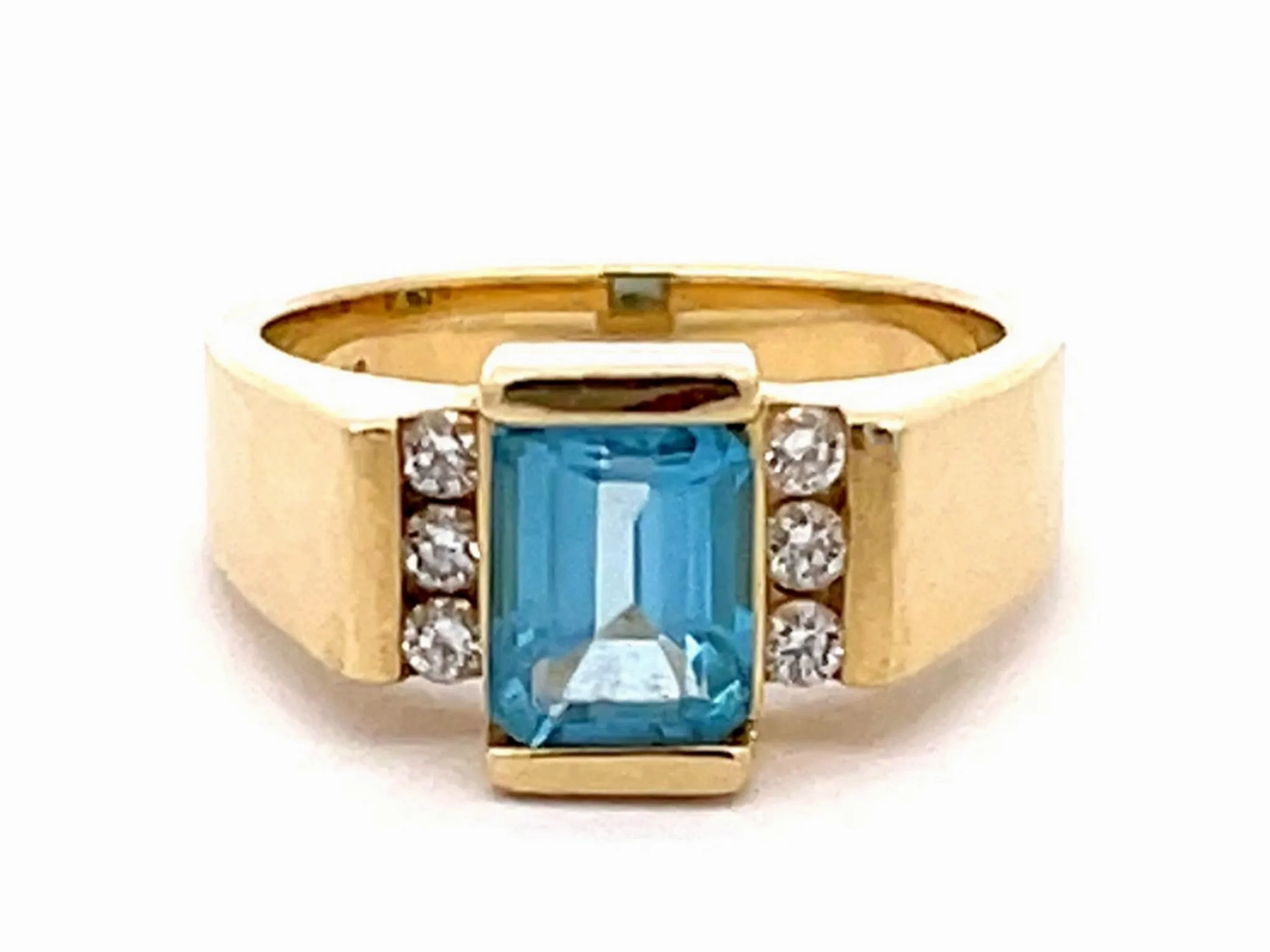 Light Blue Topaz and Diamond Ring in 14k Yellow Gold