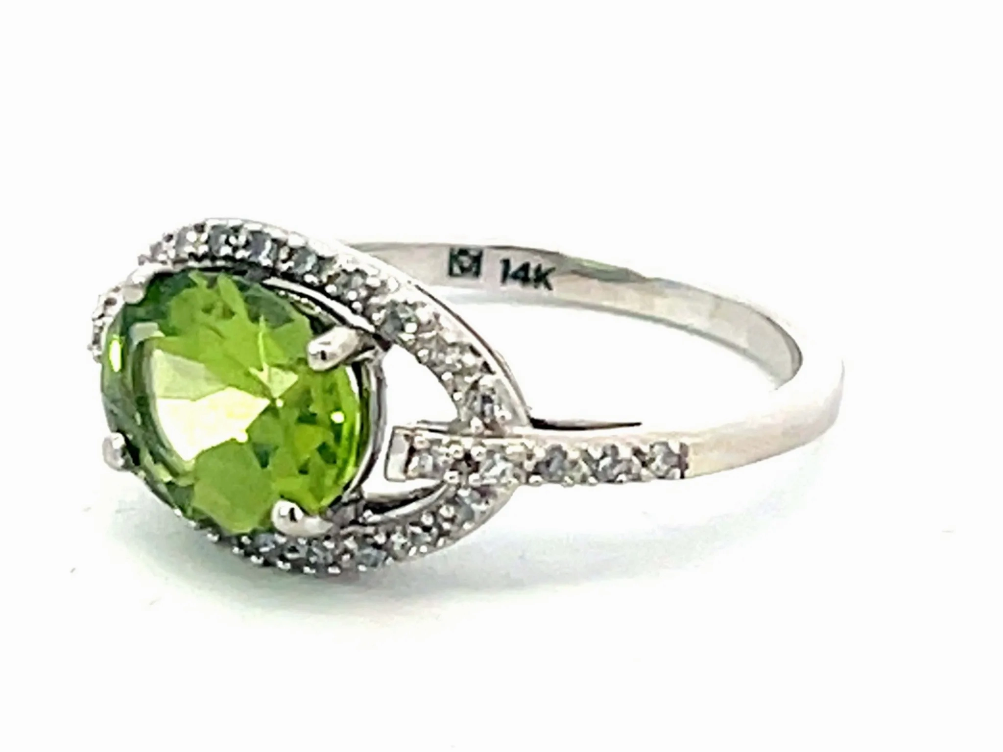 Oval Green Peridot and Diamond Halo Ring in 14k White Gold