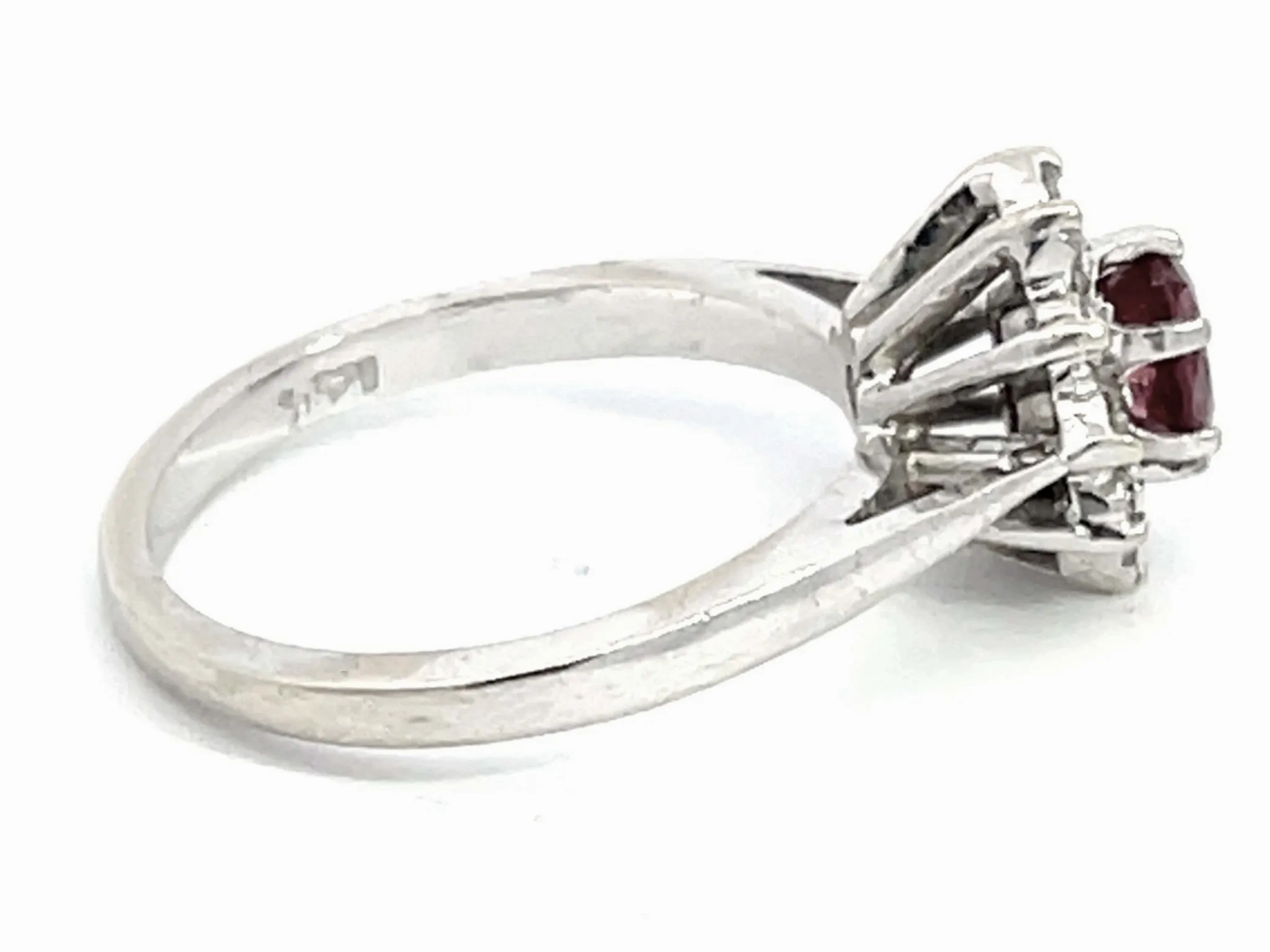 Oval Ruby and Diamond Halo Ring in 14k White Gold