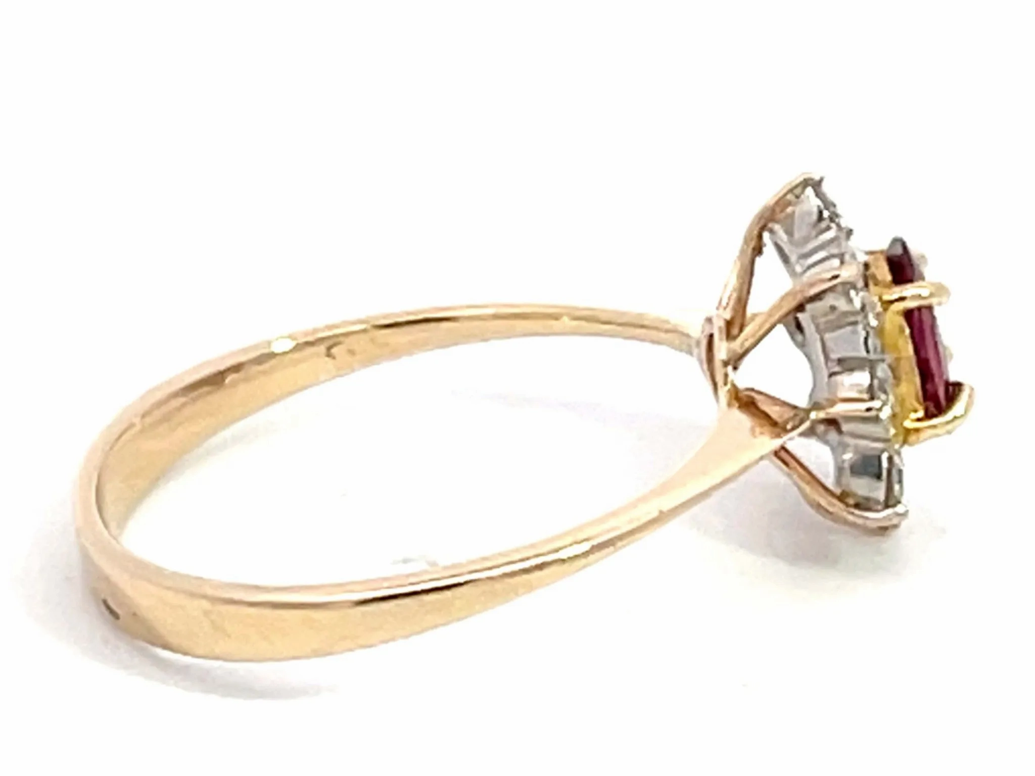 Oval Ruby and Diamond Halo Ring in 14k Yellow Gold