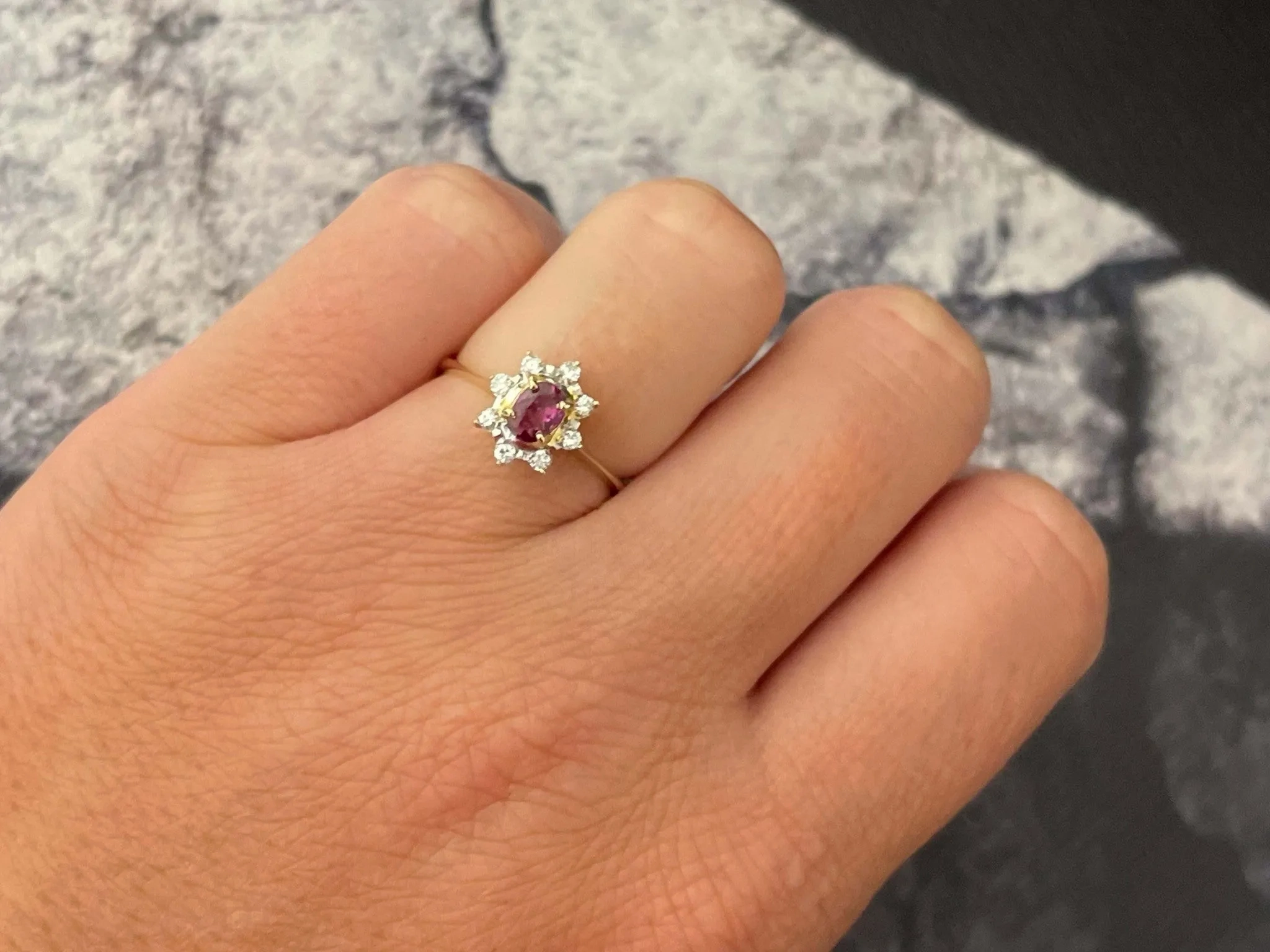 Oval Ruby and Diamond Halo Ring in 14k Yellow Gold