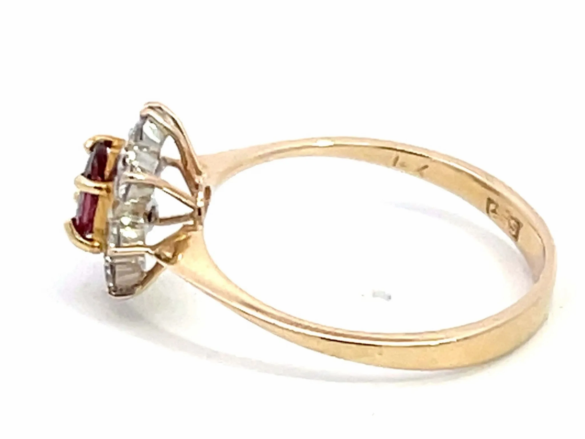 Oval Ruby and Diamond Halo Ring in 14k Yellow Gold
