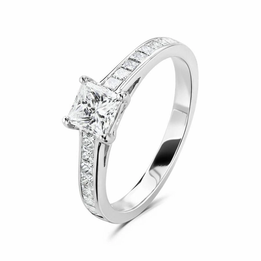 Platinum 4 claw set princess cut Diamond solitaire ring with princess cut Diamond shoulders texture-diamond  