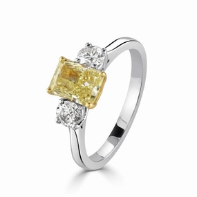 Platinum & 18ct Yellow Gold Radiant Cut Yellow Diamond & Diamond Trilogy Ring texture-diamond  