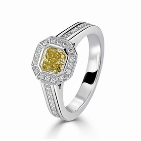 Platinum Asscher Cut Fancy Yellow Diamond & Diamond Halo Cluster Ring with Diamond Shoulders texture-diamond  