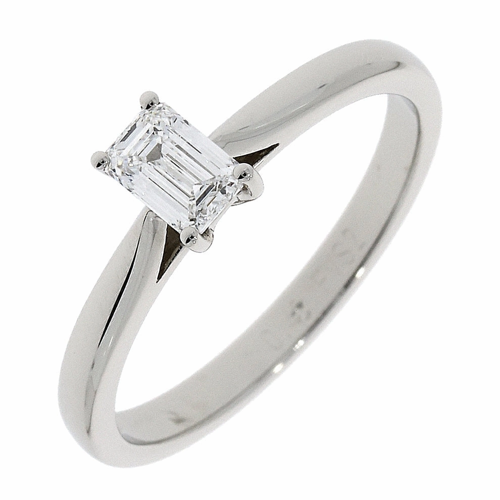Platinum claw set emerald cut Diamond solitaire ring texture-diamond  