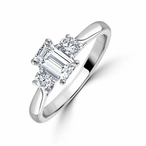 Platinum Emerald & Round Brilliant Cut Diamond Trilogy Ring texture-diamond  