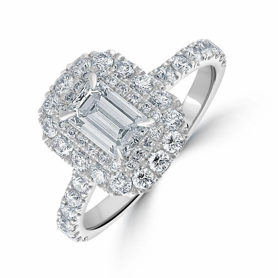 Platinum Emerald Cut Diamond Double Halo Cluster Ring with Diamond Shoulders texture-diamond  