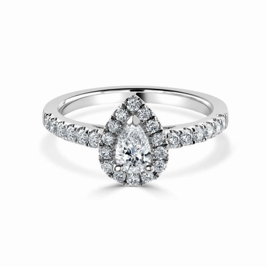 Platinum Pear Shaped Halo Cluster Ring with Diamond Shoulders texture-diamond  