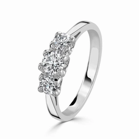 Platinum Round Brilliant Cut Diamond Trilogy Ring texture-diamond  