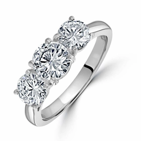 Platinum Round Brilliant Cut Diamond Trilogy Ring texture-diamond  