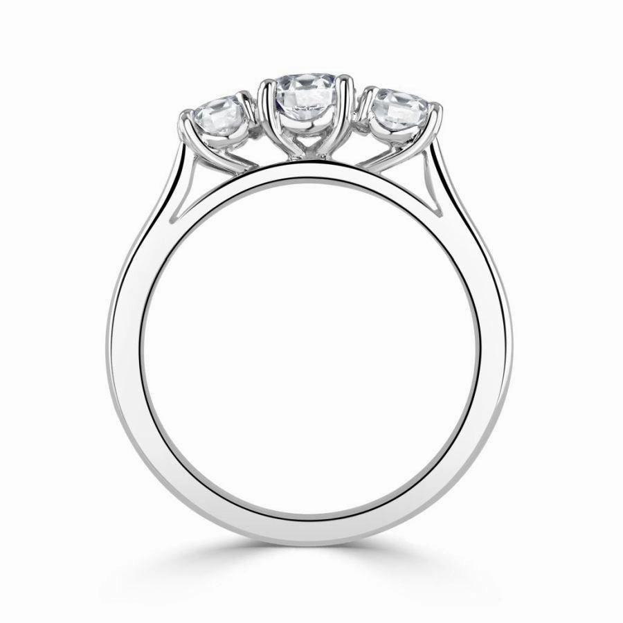 Platinum Round Brilliant Cut Diamond Trilogy Ring texture-diamond  