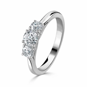 Platinum Round Brilliant Cut Diamond Trilogy Ring texture-diamond  