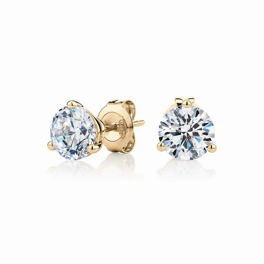 Round Brilliant stud earrings with 2.06 carats* of diamond simulants in 10 carat yellow gold