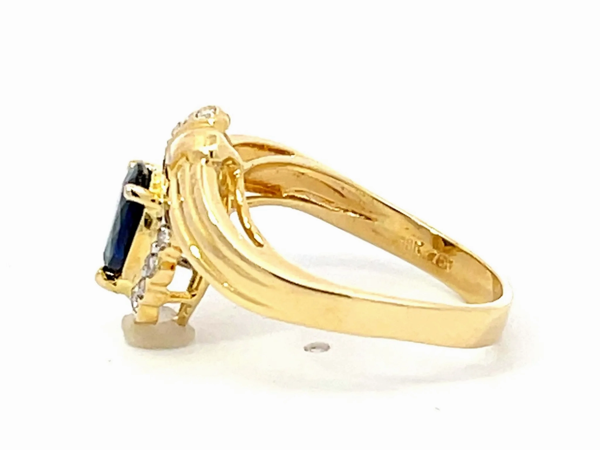 Vintage Pear Shaped Sapphire and Diamond Halo Ring in 18k Yellow Gold