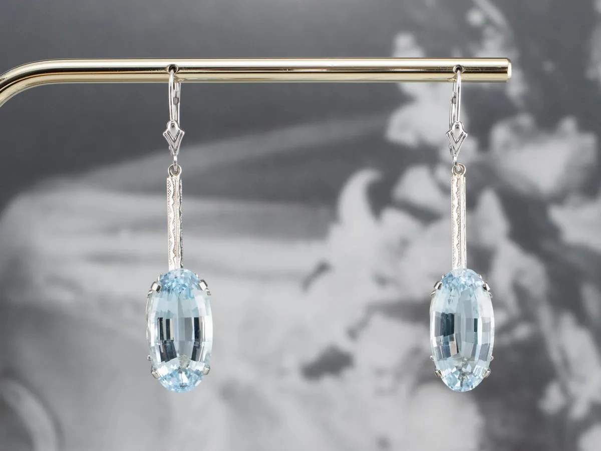 White Gold Blue Topaz Drop Earrings