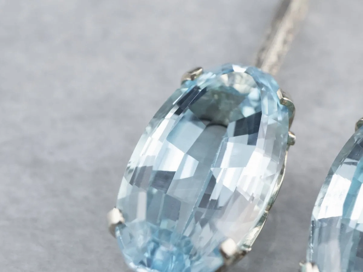 White Gold Blue Topaz Drop Earrings
