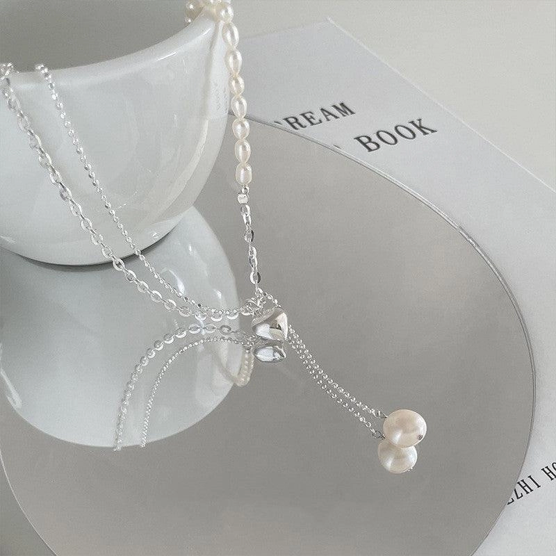 Women's Fashion Asymmetric Pearl Pendant Necklace